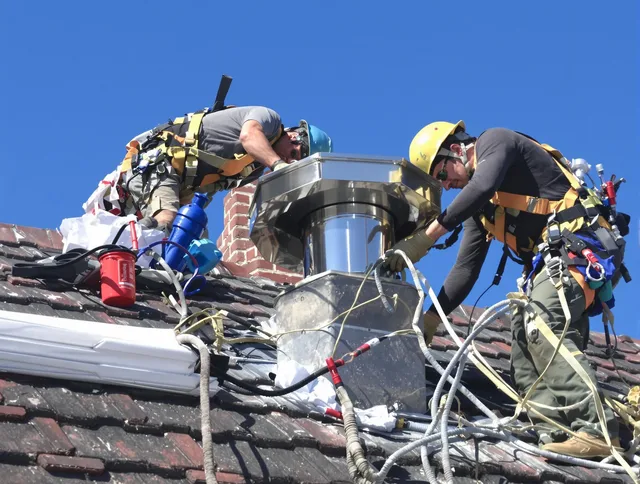 Protective chimney cap installed by Reynoldsburg Chimney Sweep in Reynoldsburg, OH